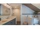 Elegant bathroom with subway tiles, double vanity, and modern fixtures for a luxurious feel at 908 N Tremain St, Mount Dora, FL 32757