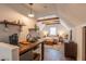 Cozy bedroom with exposed beams, kitchenette and sloped ceilings at 908 N Tremain St, Mount Dora, FL 32757