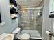 Modern bathroom features a glass-enclosed tile shower and modern fixtures at 10301 Us Highway 27 # 63, Clermont, FL 34711