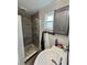 Bathroom features a tiled shower and sink at 10301 Us Highway 27 # 63, Clermont, FL 34711