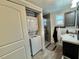 Bathroom features a shower, sink, and washer/dryer at 10301 Us Highway 27 # 63, Clermont, FL 34711