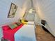 Spacious bedroom with vaulted ceilings, two comfortable beds, and a serene atmosphere in a modern, stylish home at 10301 Us Highway 27 # 63, Clermont, FL 34711