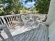 Outdoor deck with chairs, perfect for relaxing and enjoying the view at 10301 Us Highway 27 # 63, Clermont, FL 34711