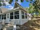 Charming home exterior featuring an A-frame window at 10301 Us Highway 27 # 63, Clermont, FL 34711