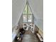 Bright living room featuring a vaulted ceiling, clerestory windows and hardwood floors at 10301 Us Highway 27 # 63, Clermont, FL 34711