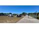 Exterior shot of the community RV and boat parking area with secure fencing at 10301 Us Highway 27 # 63, Clermont, FL 34711