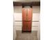 Interior closet view with wood shelving and carpeted floor at 10640 Parkway Dr, Clermont, FL 34711