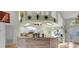 Open concept kitchen features a breakfast bar, ample storage, and a stylish design, perfect for modern living at 10640 Parkway Dr, Clermont, FL 34711