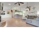 Open-concept living area combines living and kitchen space, perfect for entertaining and modern living at 10640 Parkway Dr, Clermont, FL 34711