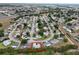 Beautiful aerial view of a Spruce Creek home in a well-maintained neighborhood at 10683 Se 174Th Loop, Summerfield, FL 34491