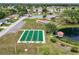 Spruce Creek community recreational area featuring bocce ball, pickle ball, and a gazebo overlooking a small pond at 10683 Se 174Th Loop, Summerfield, FL 34491