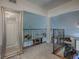 Loft area shows a decorative wrought iron railing overlooking the downstairs at 1164 E Winged Foot Cir, Winter Springs, FL 32708