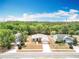 An aerial view of the property, showcasing its location within the community at 13546 Biscayne Grove Ln, Grand Island, FL 32735