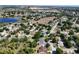 Sprawling neighborhood features a mix of housing styles, mature trees, and easy access to nearby amenities at 14421 Pine Cone Trl, Clermont, FL 34711