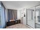 Bright enclosed porch with a view of the backyard and an access door to the side yard at 16 Pine Run, Haines City, FL 33844