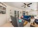 Spacious screened patio with a comfortable seating area and serene views at 16730 Beauclaire Ct, Tavares, FL 32778