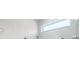 Updated shower with gray tiles and window at 1674 Cadorette Dr, The Villages, FL 34762