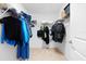 Organized walk-in closet with shelving and hanging space for storage at 1674 Cadorette Dr, The Villages, FL 34762