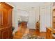 Open doorway revealing a game room with a pool table and hardwood floors at 17728 Palm View Cir, Mount Dora, FL 32757