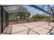 Spacious enclosed patio with ample space for outdoor living and entertaining, perfect for relaxation at 17825 Whisperwind Dr, Clermont, FL 34715