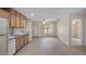 Cozy living space adjacent to the kitchen, offering a bright and airy feel with natural light at 17825 Whisperwind Dr, Clermont, FL 34715