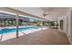 Large screened in lanai with a large pool and room for entertaining at 17825 Whisperwind Dr, Clermont, FL 34715