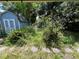 Backyard with blue shed at 1920 Baxter Ave, Orlando, FL 32806