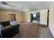 View of the living room leading to the dining room and kitchen at 1920 Baxter Ave, Orlando, FL 32806
