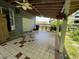 Spacious covered patio with tile flooring at 1920 Baxter Ave, Orlando, FL 32806