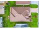 Aerial view of the home showcasing the roof, landscaping, and surrounding neighborhood at 2120 Callaway Dr, The Villages, FL 32162