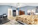 Large bedroom with blue walls, ceiling fan, and walkout to the lanai at 2120 Callaway Dr, The Villages, FL 32162