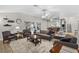 Bright living room showcasing vaulted ceilings, neutral walls, and an open floorplan at 2120 Callaway Dr, The Villages, FL 32162