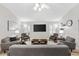 Bright living room features neutral walls, vaulted ceilings, and stylish furnishings at 2120 Callaway Dr, The Villages, FL 32162