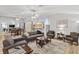 Spacious living room with modern furniture and neutral tones, offering a cozy atmosphere at 2120 Callaway Dr, The Villages, FL 32162