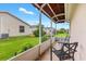 View from screened in porch showing well-manicured lawn and lush landscaping at 2120 Callaway Dr, The Villages, FL 32162