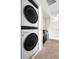 Convenient laundry area with stackable washer and dryer, maximizing space and efficiency at 2202 Garden Belle Dr, Clermont, FL 34711