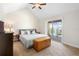 Comfortable main bedroom with access to an outside balcony at 2202 Garden Belle Dr, Clermont, FL 34711