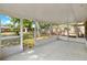 Bright screened patio with open space and views of the green backyard, great for outdoor enjoyment at 2209 Hutchinson Ave, Leesburg, FL 34748