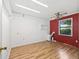 Spare room with wood floors, ceiling fan, and bright natural light at 2401 Greenlaw Ct, Leesburg, FL 34788