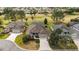 Beautiful single-story home with mature landscaping and an attached two-car garage at 2706 Radbourne Way, The Villages, FL 32162