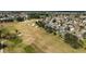 Aerial view of a residential neighborhood with a golf course at 2706 Radbourne Way, The Villages, FL 32162