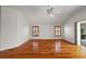 Bright bedroom boasts vaulted ceilings, hardwood floors, shutters and ample natural light at 2706 Radbourne Way, The Villages, FL 32162