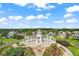 Community landmark with a lighthouse and landscaped surroundings offering a picturesque setting at 3584 Tropical Seas Loop, Tavares, FL 32778
