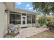 Private patio with room for entertaining featuring peaceful garden view at 3584 Tropical Seas Loop, Tavares, FL 32778