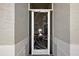 Close up of the decorative security screen door with a palm tree design at 3584 Tropical Seas Loop, Tavares, FL 32778