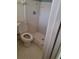 Bathroom with white tiled shower stall and standard toilet at 37 N Normandale Ave, Orlando, FL 32835