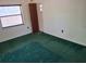 Bedroom with natural light and standard closet with carpeted flooring at 37 N Normandale Ave, Orlando, FL 32835