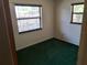 Bedroom features two windows with carpeted flooring at 37 N Normandale Ave, Orlando, FL 32835