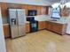 Well-lit kitchen featuring stainless steel appliances and light countertops at 37 N Normandale Ave, Orlando, FL 32835