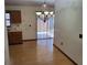Kitchen and dining area with laminate floors and a chandelier above dining table at 37 N Normandale Ave, Orlando, FL 32835